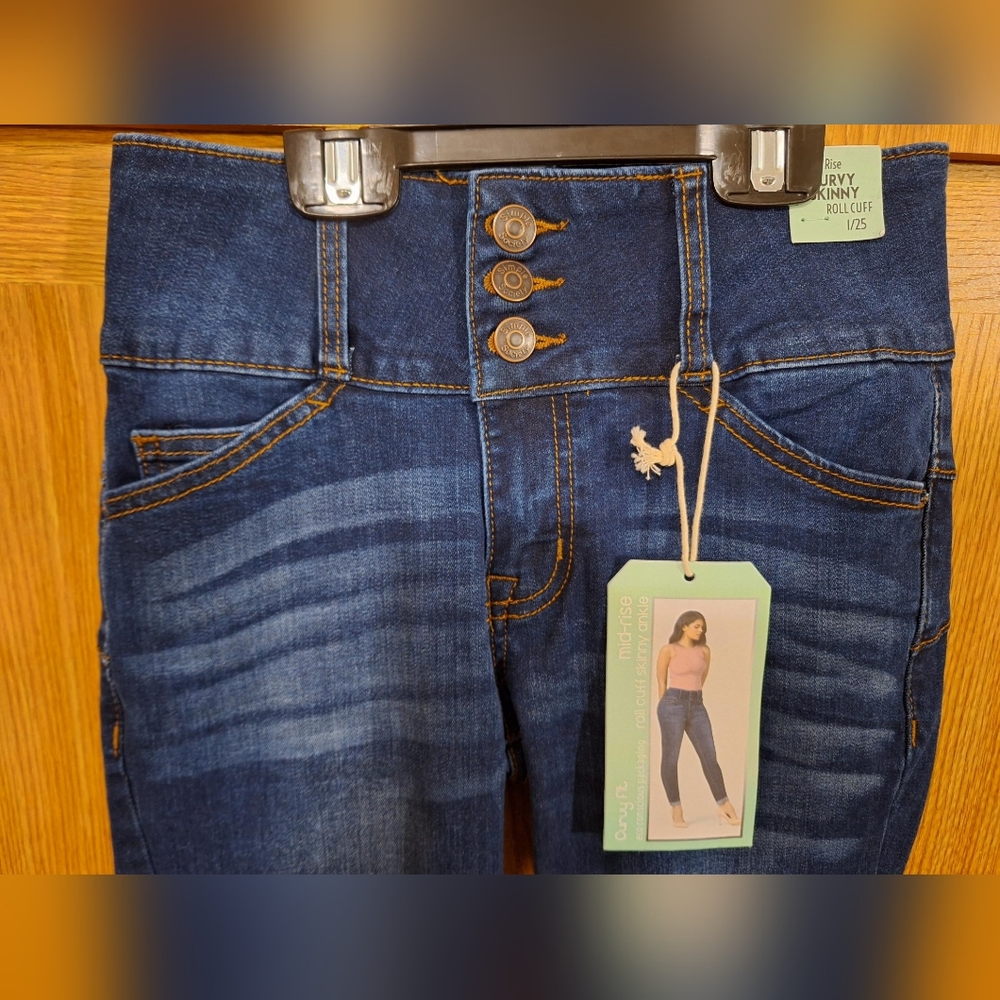 Women's size 1/25 rolled cuff jeans